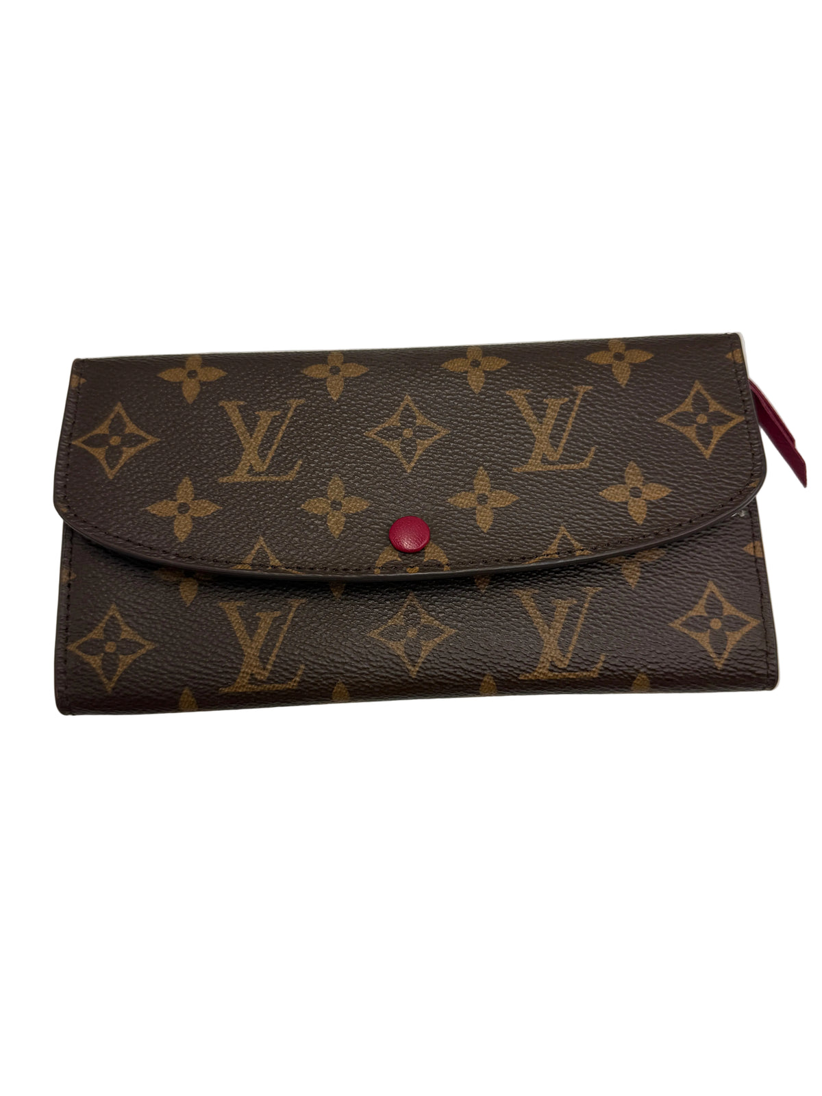 A Louis Vuitton monogram wallet in brown coated canvas with tan LV logos and floral motifs, featuring a small red snap button on the front flap and a red fabric pull tab on the right side, photographed on a plain light background.