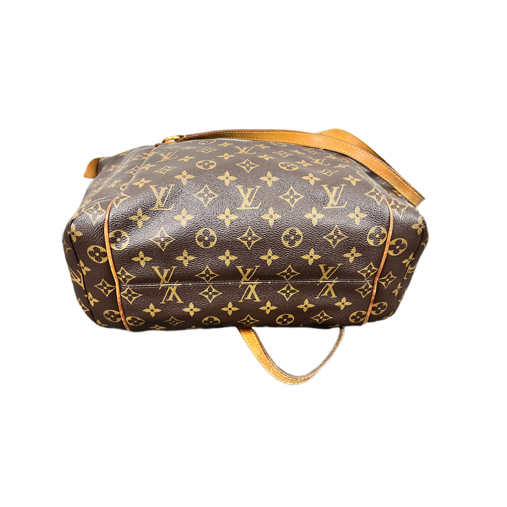A Louis Vuitton monogram canvas shoulder bag in brown with gold-tone monogram print and tan leather trim, shown against a plain white background.