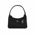 Front view of a black Prada Re-Edition 2000 nylon mini bag with a triangle logo and woven handle.