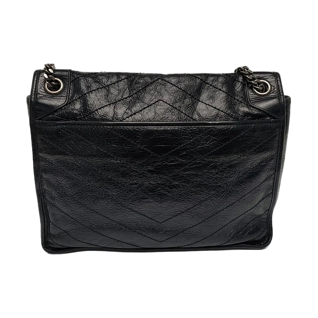 back view of black saint laurent niki medium bag in excellent condition 