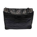 back view of black saint laurent niki medium bag in excellent condition 