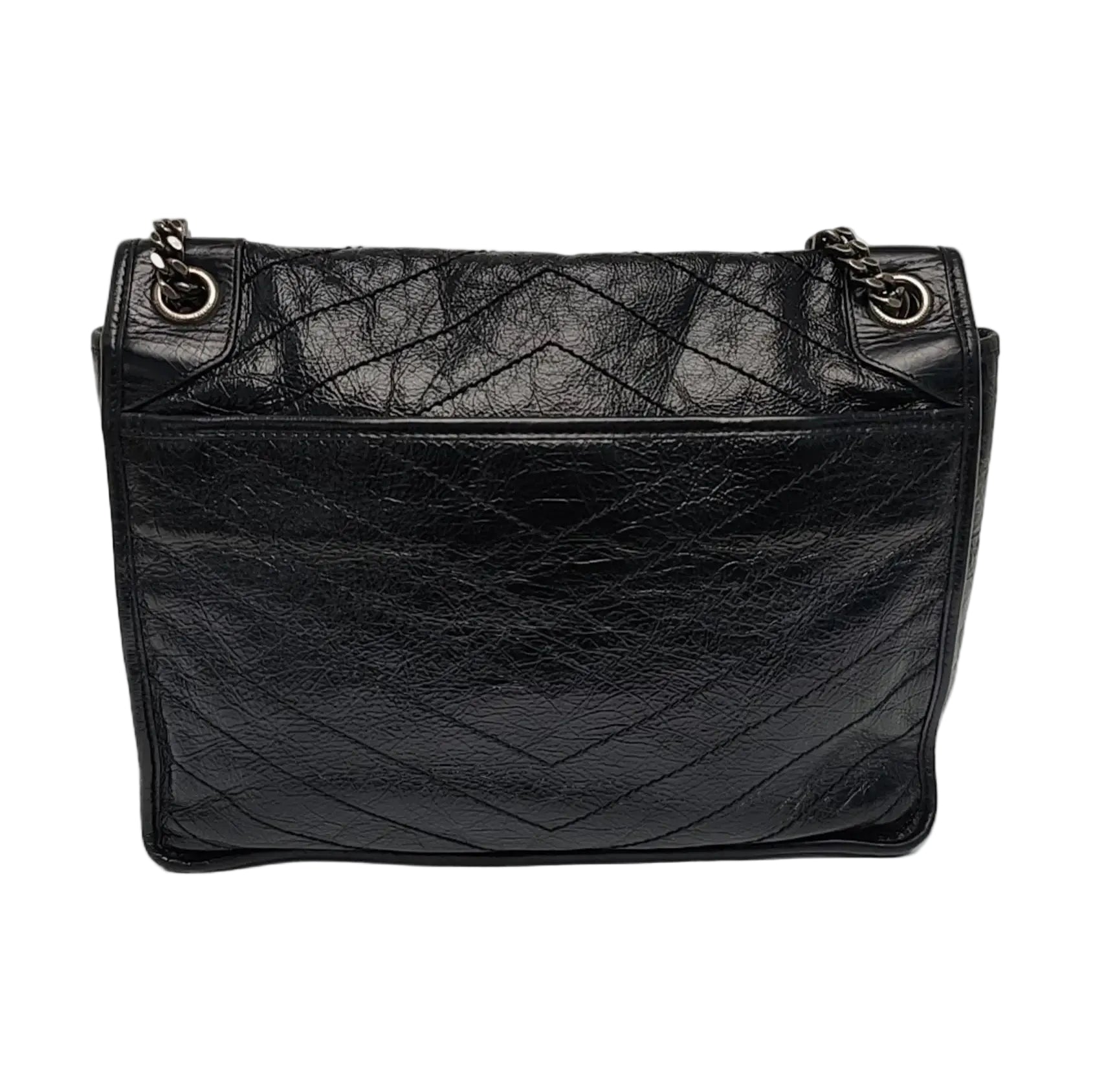 back view of black saint laurent niki medium bag in excellent condition 