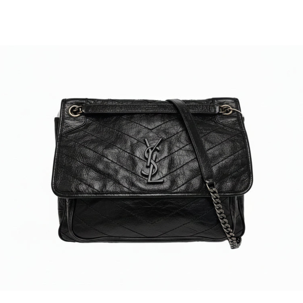 preloved saint laurent black quilted handbag with a ysl logo with black hardware front view 