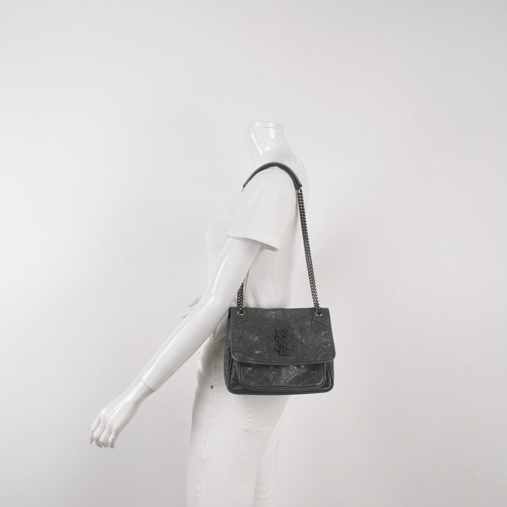 preloved saint laurent shoulder bag in grey soft leather with ysl logo in the front for size reference